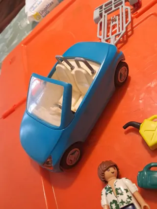 Coche descapotable Playmobil con accesorios