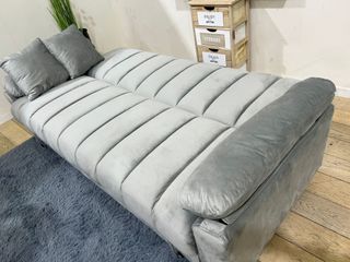 Sofá cama gris con arcón