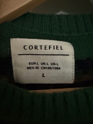 Jersey verde con estampado geométrico