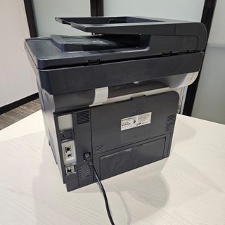 Impresora HP LaserJet Pro MFP M521dn