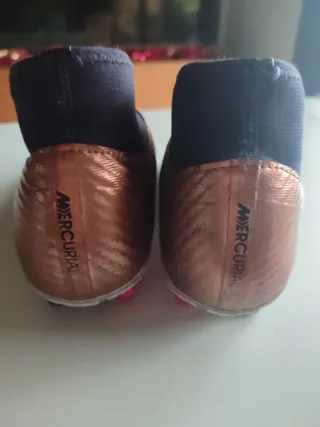 Botas de fútbol Nike niño doradas/moradas
