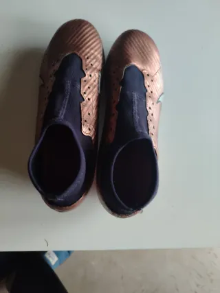 Botas de fútbol Nike niño doradas/moradas
