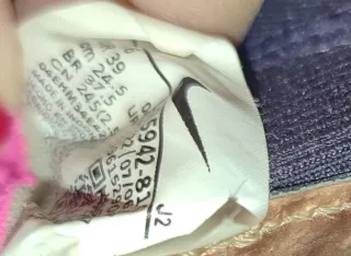 Botas de fútbol Nike niño doradas/moradas