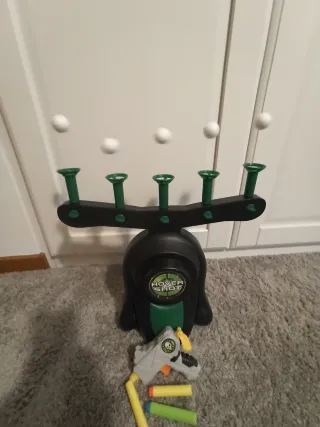 Pistola de Juguete y Diana Voladora