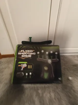 Pistola de Juguete y Diana Voladora