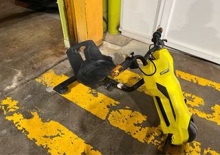 Triciclo eléctrico infantil amarillo