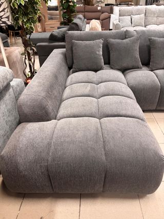 Sofá doble chesslong con cojines