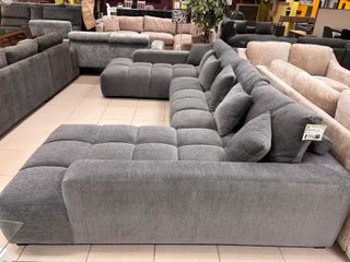 Sofá doble chesslong con cojines