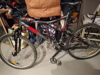 Bicicleta de montaña Rockrider doble suspensión