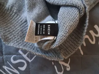 Jersey largo cuello alto gris