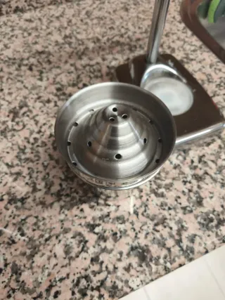 Exprimidor de naranjas mecánico