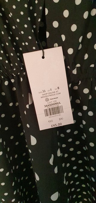 Mono Miss Selfridge lunares