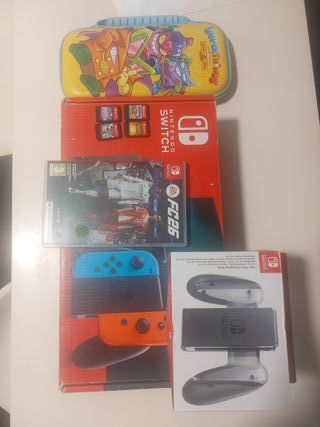 Nintendo Switch + 2 mandos + 5 juegos