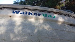 Barco Walker Bay con remolque y remos