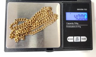 Cadena Alternada de oro de 18k, 40 g, 68.5 cm.