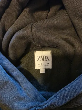 Sudadera gris con logo. Talla 13- 14