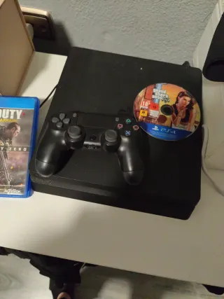 PS4 Slim Nero + 4 Giochi