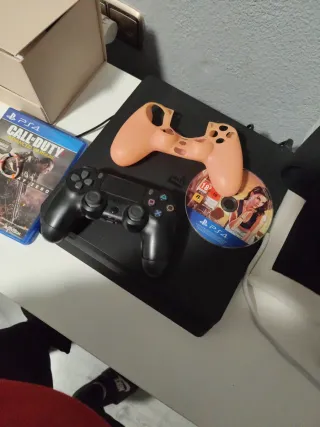 PS4 Slim Nero + 4 Giochi