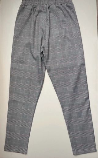 Pantaloni a quadri grigi e rosa