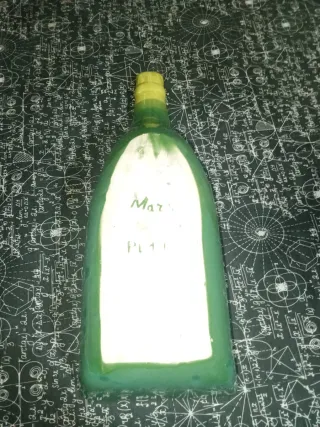 Botellero verde forma botella