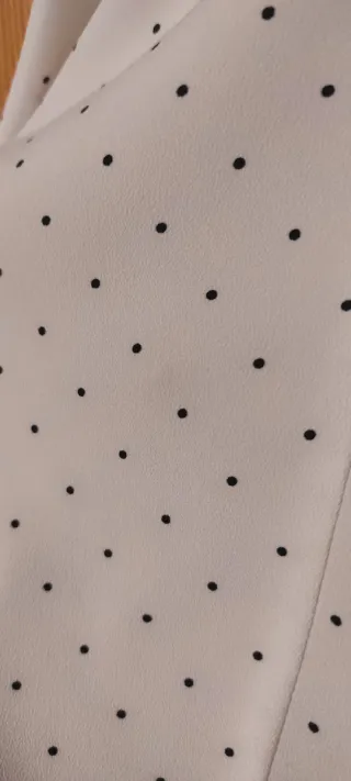 Camisa sin mangas lunares