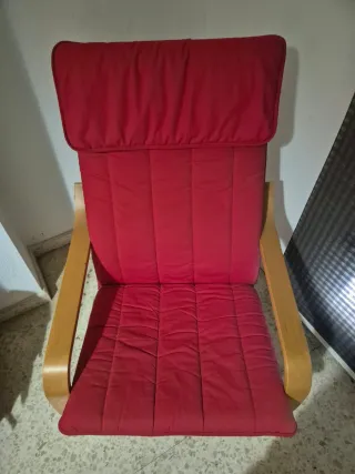 Butaca mecedora de tela y madera