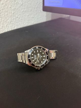 Reloj Rolex Negro y Plateado