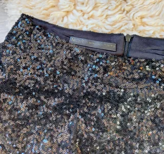 Talla S - Minifalda negra péplum y lentejuelas