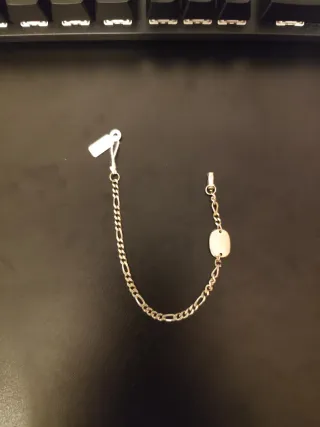 Pulsera de plata con placa ovalada