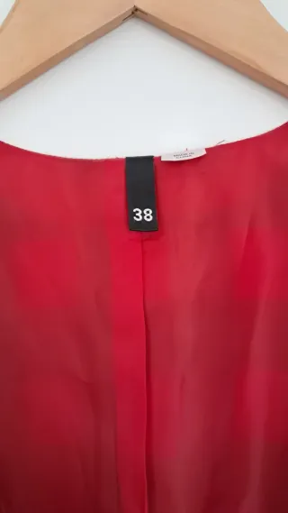 Chaleco de cuadros rojo y negro