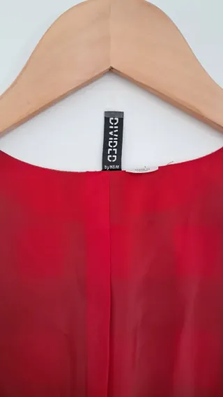 Chaleco de cuadros rojo y negro