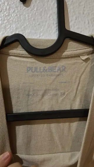 Camiseta beige con estampado