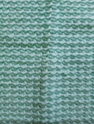 Manta de bebé tejida color turquesa