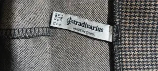 Falda pantalón cuadros marrón y negro.