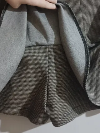 Falda pantalón cuadros marrón y negro.