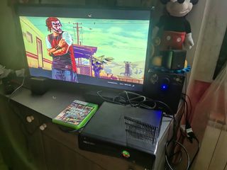 Xbox 360 Slim 40 GB +11 Giochi(Senza Controller)