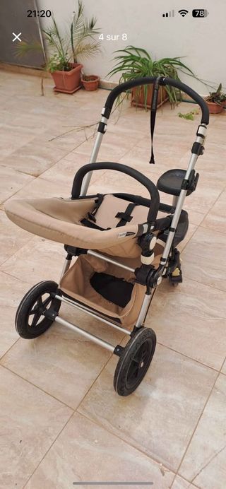 Carro de bebé color beige