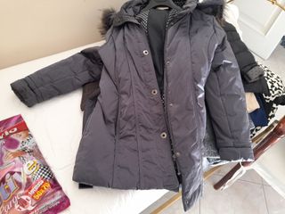 Piumino donna grigio con cappuccio e pelliccia