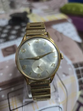 Reloj pulsar de cuerda chapaso oro funcionando