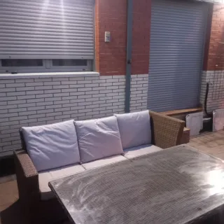 Sofá de jardín mimbre y cristal