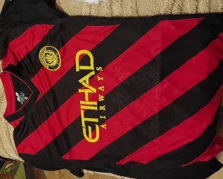 Camiseta Juventus Naranja y Negra y más camisetas