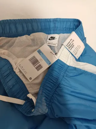 Pantalón chándal Nike hombre azul y blanco