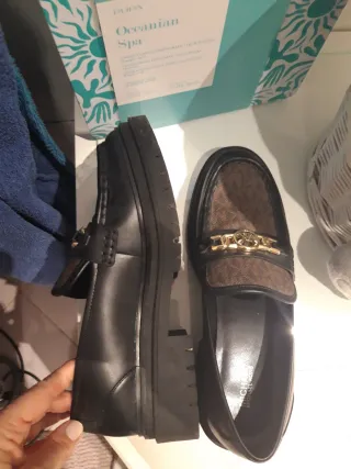 Mocassini Michael Kors neri e marroni