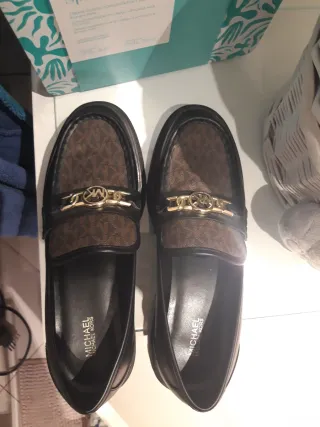 Mocassini Michael Kors neri e marroni