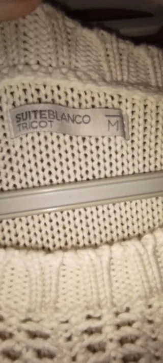 Jersey beige con flecos y detalles