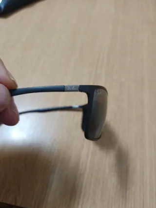 Gafas de sol Ray-Ban negras y grises