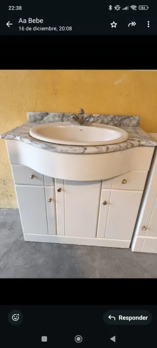 Lavabo con mueble y grifo