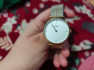 Reloj Cluse Dorado y Plateado lo vendo a mano
