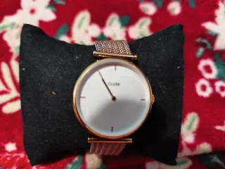 Reloj Cluse Dorado y Plateado lo vendo a mano