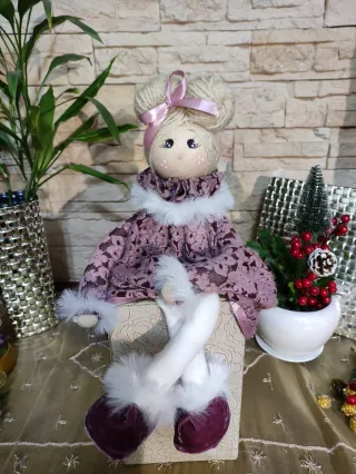 Bambola in tessuto fatta a mano